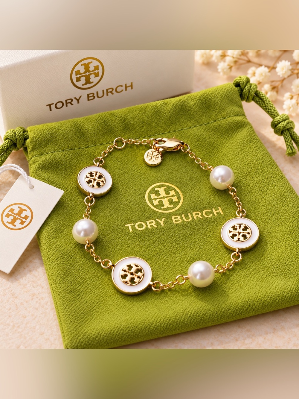 Tory Burch Gold-Tone Logo & White Enamel Pearl Bracelet